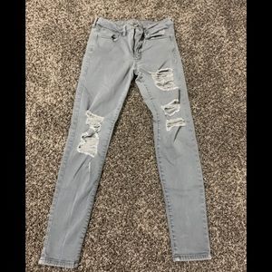 Light grey ripped skinny jeans